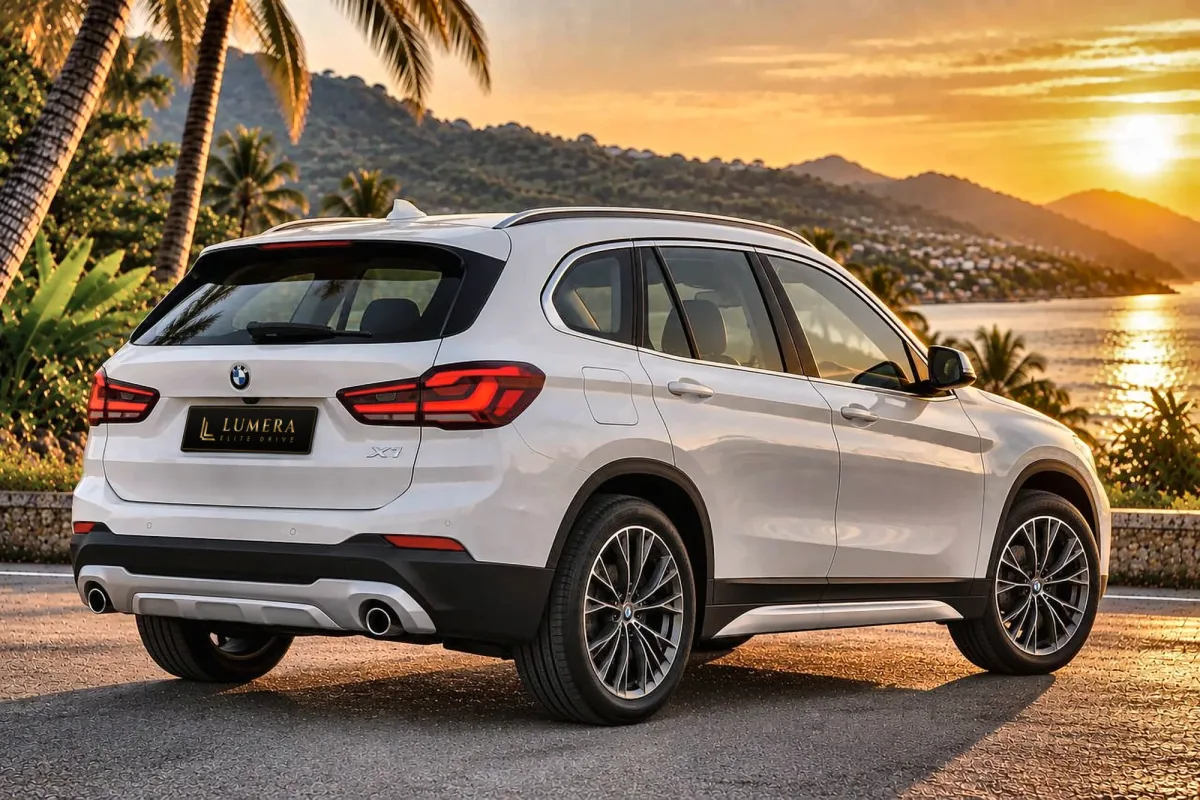 BMW X1 by a villa at sunset